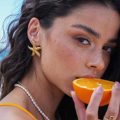 Boucles d'oreilles étoile de mer courbée